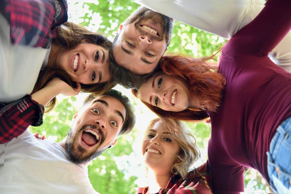 Joyful Pals Capturing Memories Grinning And Striking Poses For A Group  Selfie With Their Smartphone While Enjoying A Funfilled Day At The Beach  Photo Background And Picture For Free Download - Pngtree